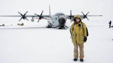 Graduate student Ali Giese at a research center at the apex of the Greenland ice sheet